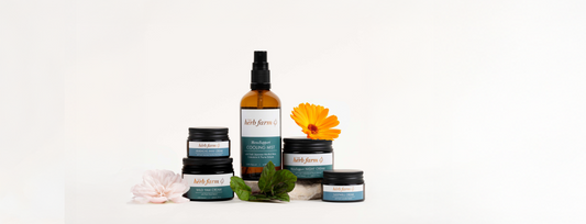 Menopause Support Product Lineup with flowers and herbs. 